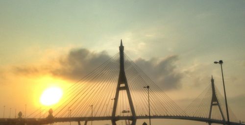 Suspension bridge at sunset