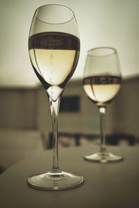 Close-up of wine in glass on table