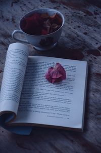 High angle view of text on book on table