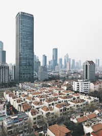 Shangai cityscape against sky