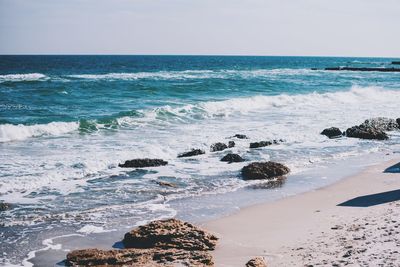 Scenic view of sea against clear sky