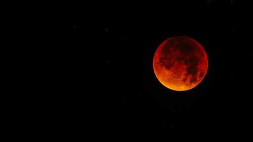 Low angle view of moon in sky