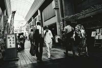 Full length of woman standing in city