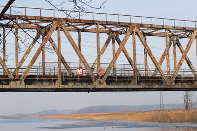 Bridge over river against sky