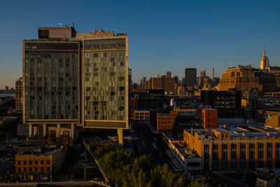 High angle view of buildings in city against sky