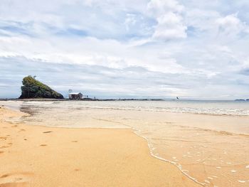 Scenic view of beach against sky