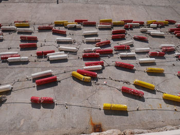 High angle view of multi colored pencils in row