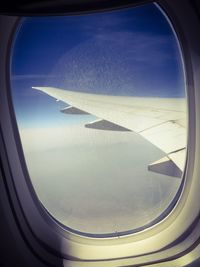 Cropped image of airplane wing