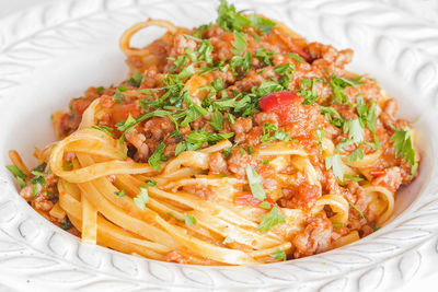 High angle view of pasta in plate on table