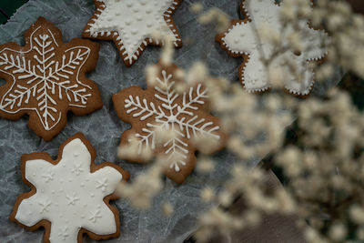 High angle view of cookies on christmas tree during winter