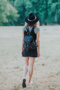 Rear view of woman walking outdoors