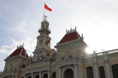 Low angle view of bell tower against sky