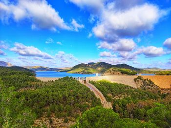 Scenic view of river against sky