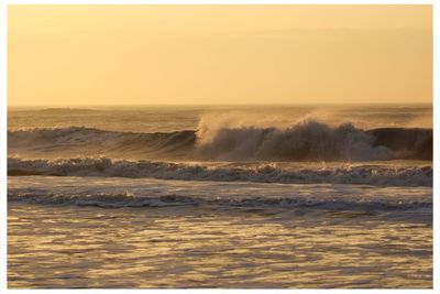 Scenic view of sea during sunset