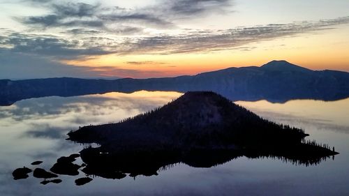 Scenic view of mountains against sky during sunset