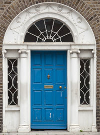 Closed door of blue building