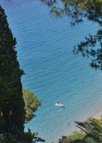 High angle view of people by sea