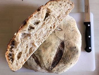 High angle view of bread on cutting board