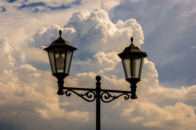 Low angle view of street light against sky