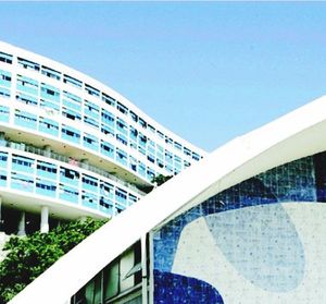 Low angle view of building against clear blue sky