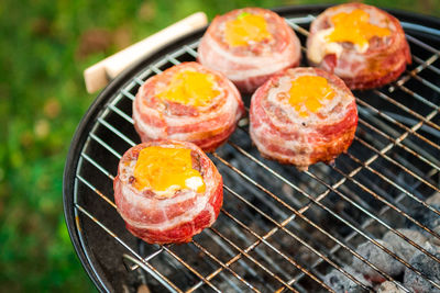 High angle view of meat on barbecue grill