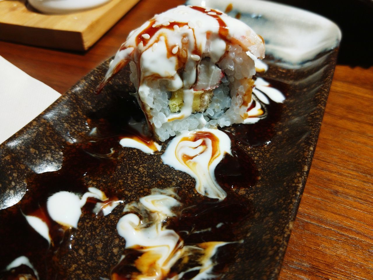 HIGH ANGLE VIEW OF CHOCOLATE ICE CREAM ON TABLE