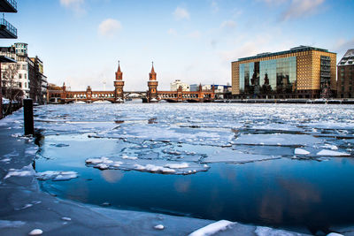 Buildings in city during winter