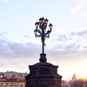 Low angle view of street light against sky