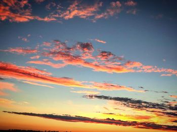 Low angle view of clouds in sky during sunset