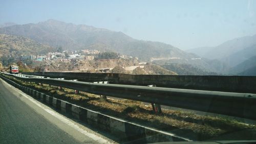 Landscape with mountain range in background