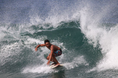 Man surfing in sea