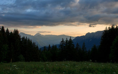 Scenic view of mountains against sky during sunset