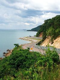 Scenic view of sea against cloudy sky