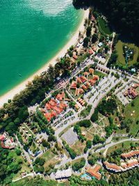 High angle view of town by sea