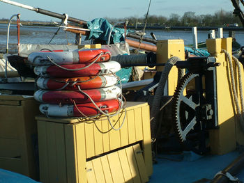 Boats moored at harbor