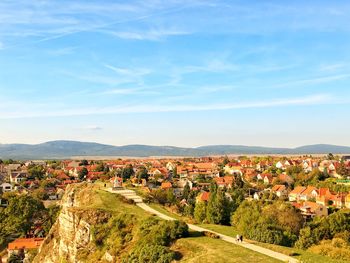 Aerial view of townscape against sky