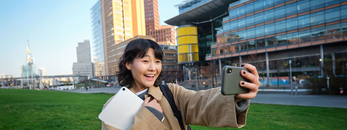 Young woman using mobile phone