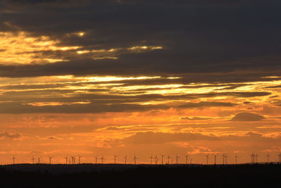 Scenic view of landscape against sky during sunset