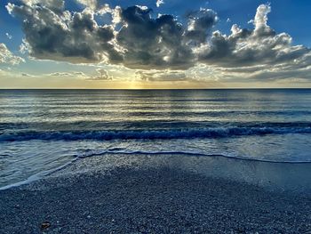 Scenic view of sea against sky during sunset