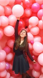 High angle view of woman with balloons