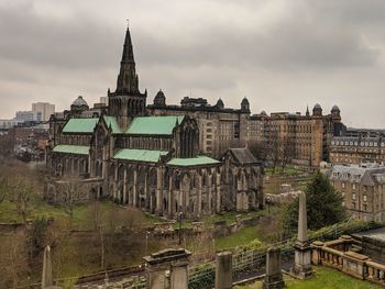 Exterior of historic cathedral building against sky in city of glasgow, scotland. 