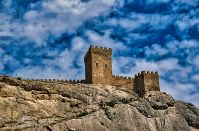 Low angle view of fort against sky