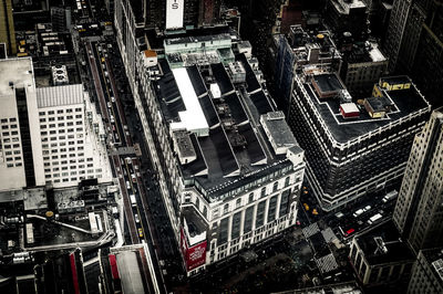 Aerial view of city lit up at night