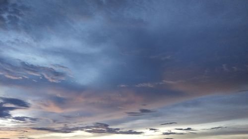 Low angle view of clouds in sky during sunset