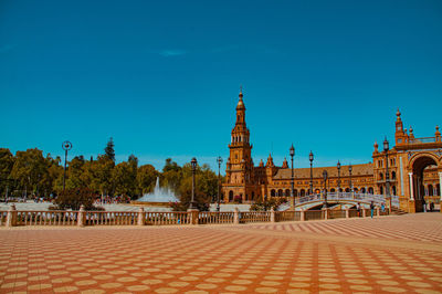 Low angle view of building against blue sky