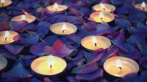 High angle view of illuminated candles