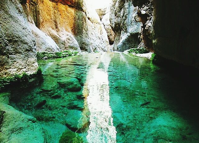 water, rock, beauty in nature, solid, rock - object, scenics - nature, rock formation, nature, day, no people, flowing water, waterfall, land, flowing, tranquil scene, non-urban scene, outdoors, tranquility, travel destinations, turquoise colored