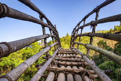 Traditional bamboo bridge for crossing river at forest at morning from different angle