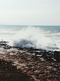 Scenic view of sea against clear sky