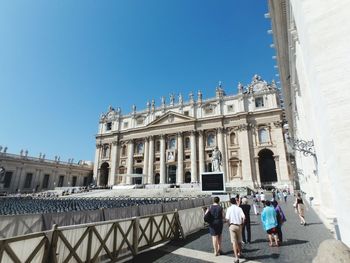 People walking in front of vatican